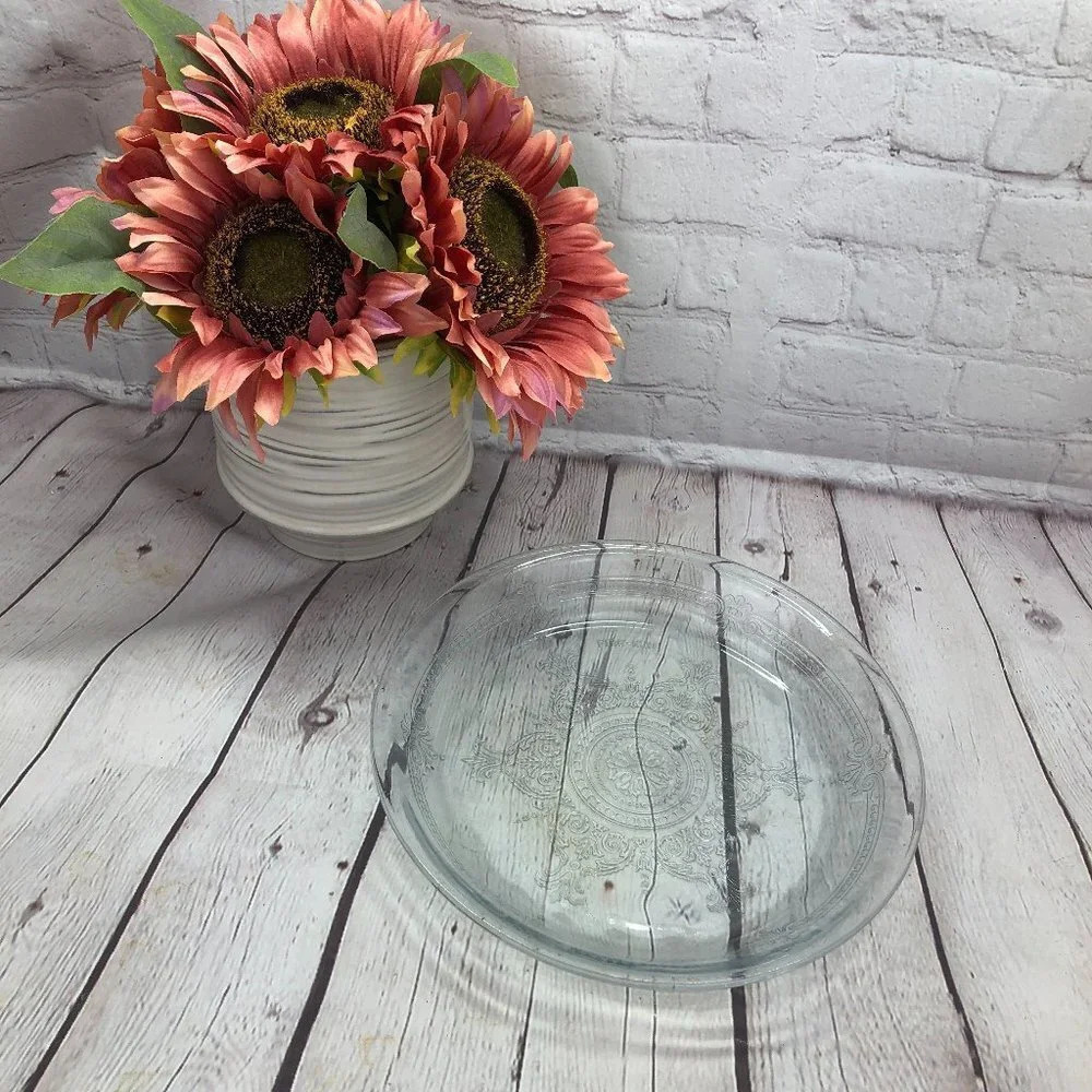 vintage fire king embossed pie plate